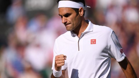 Em clima descontraído, Federer e Ruud disputam tie-break, com vitória do suíço, reacendendo a paixão dos fãs pelo ídolo - Imgem : Reprodução/DANIEL LEAL-OLIVAS / AFP