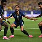 Vini Jr., Matheus Cunha e Lucas Paquetá comemorando gol contra o Haiti - Imagem: Reprodução/MAURO PIMENTEL/AFP