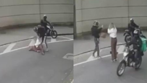 Vítimas caminhavam pela calçada quando foram surpreendidas por criminosos em uma motocicleta - Imagem: Reprodução