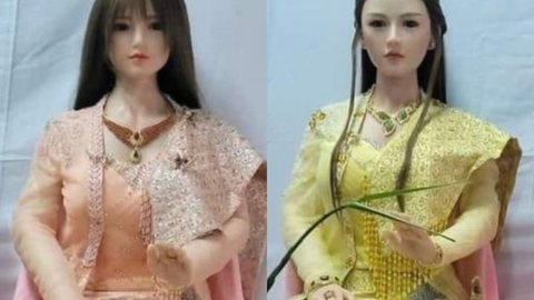 Bonecas com tiaras e roupas tradicionais - Imagem: reprodução Facebook