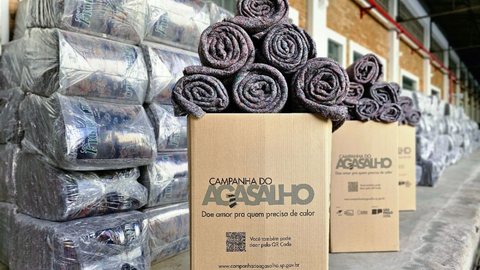 As doações estão sendo distribuídas a ONGs e comunidades locais, com informações disponíveis no site da Prodesp para pontos de coleta - Imagem: Reprodução/Agência SP