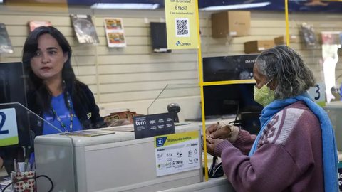 A adesão ao acordo pode ser feita pelo aplicativo Meu INSS ou nas agências dos Correios, sem custos adicionais - Imagem: Reprodução / Antonio Cruz / Agência Brasil