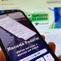 Receita Federal orienta a evitar intermediários e alerta que restituição é automática e gratuita, sem necessidade de pagamento - Imagem: Reprodução/Cris Almeida / Valor Investe