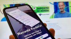 Receita Federal orienta a evitar intermediários e alerta que restituição é automática e gratuita, sem necessidade de pagamento - Imagem: Reprodução/Cris Almeida / Valor Investe