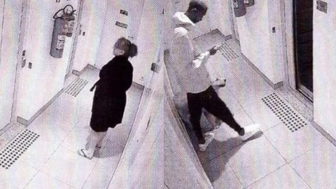 Eddy e a agressora são vistos em corredor de condomínio - Imagem: reprodução/Facebook