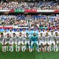 Seleção iraniana perfilada para partida contra a Nova Zelândia, válida pelo grupo G da Copa do Mundo de 2026 - Imagem: Reprodução/Agência de Notícias Xinhua