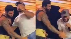 VÍDEO - Gusttavo Lima choca ao 'agarrar' pênis de cantor em show; assista - Imagem: reprodução redes sociais