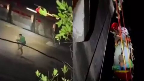 VÍDEO: homem é jogado de ponte por sequestradores e desfecho surpreende - Imagem: reprodução Corpo de Bombeiros