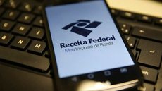 Documentos como informes de rendimentos e comprovantes de despesas são fundamentais para a declaração do IR 2026 - Imagem: Reprodução/ Marcello Casal Jr/Agência Brasil