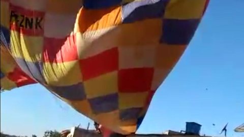 Vídeo mostra pouso forçado de balão tripulado.