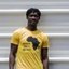 Imigrante estampa “África não um é país” em camisa após ser alvo de racismo