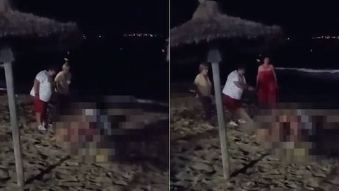 VÍDEO - mulheres que faziam sexo no meio da praia são atingidas por areia - Imagem: reprodução redes sociais