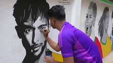 Torcedores de Bangladesh foram às ruas com bandeiras do Brasil em homenagem à Seleção e ao craque Neymar antes da Copa do Mundo. - Imagem: Reprodução / Reuters