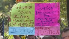 Familiares e amigos de Tainara se uniram em um protesto silencioso, exigindo justiça e mudanças efetivas contra o feminicídio - Imagem: Reprodução/G1/TV Globo