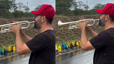 Fabiano Duarte toca trompete durante a caminhada pró-Bolsonaro que segue rumo a Brasília - Imagem: @trom_petista13