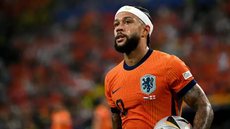 Memphis Depay em jogo pela seleção holandesa - Imagem: Reprodução/AFP