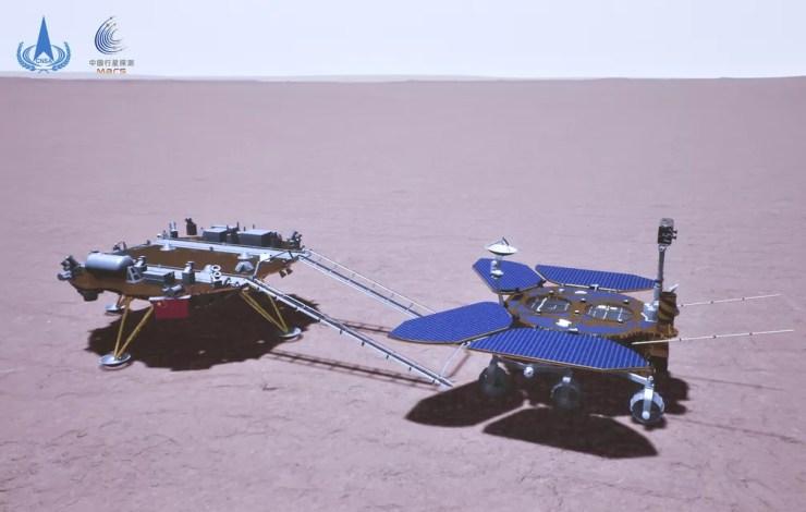 A foto, uma renderização artística, mostra o robô Zhurong (à direita) descendo da plataforma de pouso (à esquerda) e tocando o solo em Marte. — Foto: CNSA via AP