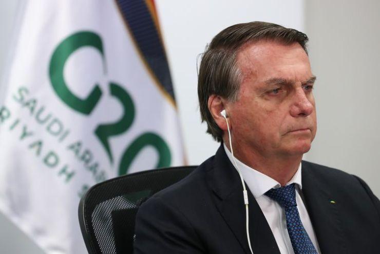 O presidente da República, Jair Bolsonaro, participa da reunião da Cúpula de Líderes do G20 em formato virtual no palácio do Planalto