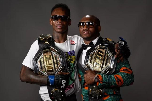Israel Adesanya e Kamaru Usman são os nigerianos donos de cinturões do UFC — Foto: Getty Images