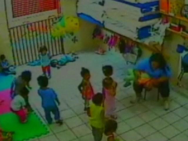 Imagens das câmeras de segurança mostram mulher com crianças (Foto: Reprodução/TV TEM)