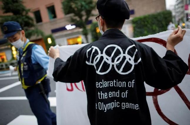 Protestos Tóquio 1 ano Olimpíadas — Foto: REUTERS/Issei Kato